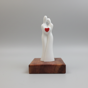 Couple Embrace Figurine with Heart